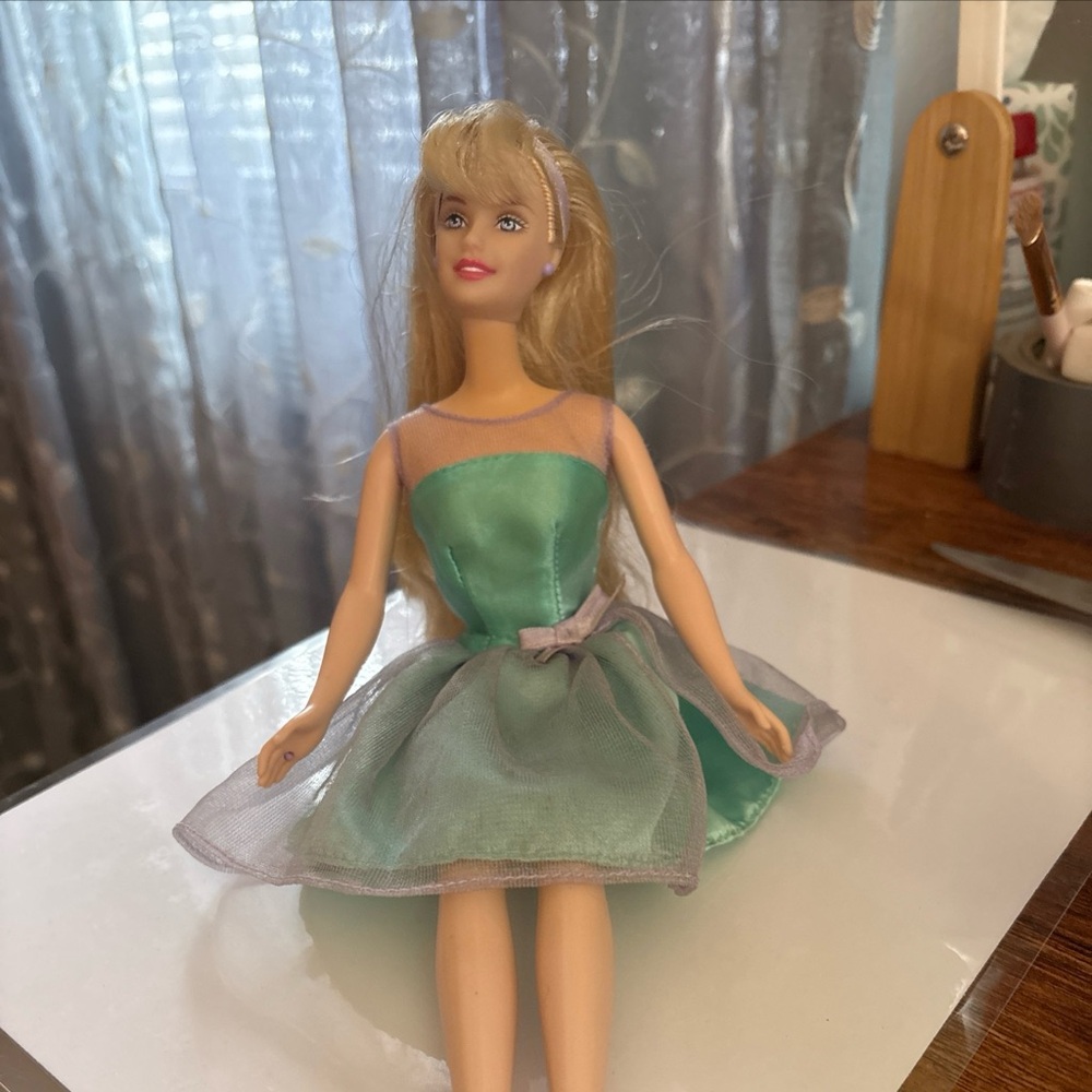 Elegant Doll in Teal Dress with Silver Accents